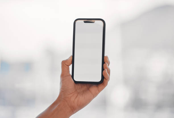 istock Closeup, mockup and hand with a smartphone, screen and social media with network, connection and email. Cellphone, person and contact with mobile app, blank ux and chat with data, sms and message 1629508043
