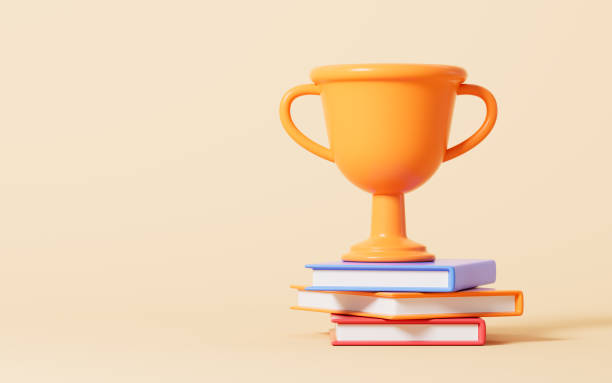 istock Cartoon trophy and books in the yellow background, 3d rendering. 1629508086