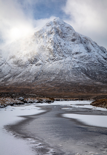 The summit of Buachaille Etive Mor in Glencoe in dramatic winter light
