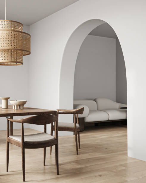 istock Wooden beige diningroom interior with dining table, lamp and chairs. Minimalism light Japanese natural livingroom with sofa and mock up empty picture frame. 3d rendering. High quality 3d illustration 1629512021