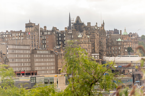 Traditional old gothic houses at street in downtown Edinburgh Scotland England UK