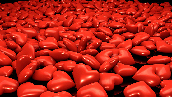 Hundreds of red hearts on a black floor create a rough concept. / You can see the animation movie of this image from my iStock video portfolio. Video number: 1596185582