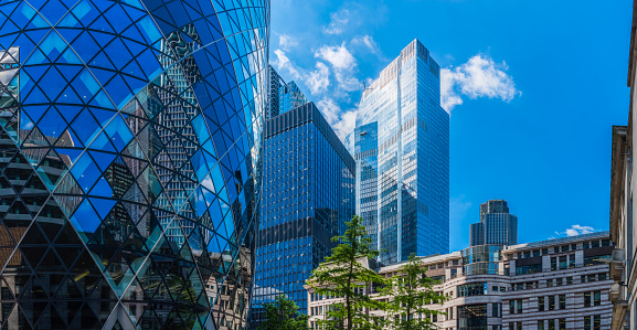 Looking up to the glass and steel skyscrapers in the heart of London’s Financial District.