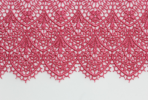 the macro photo of the fabric with lace