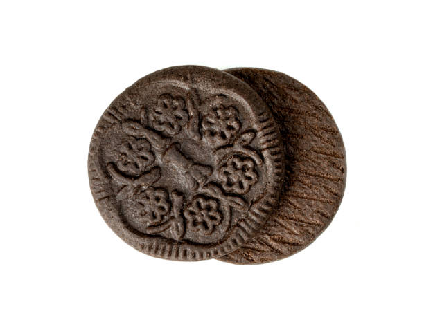istock black chocolate cookies isolated on white background 1629573329
