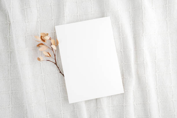 istock Empty Wedding invitation mockup on linen fabric background 1629573881