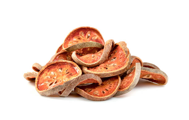 istock Dry bael fruit or Aegle marmelos isolated on white background 1629576740
