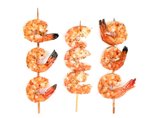 istock roasted peeled prawn with skewer isolated on white background ,grilled shrimp 1629578974