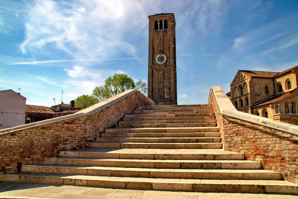 view of the bell tower and the basilica of saints Maria and Donato in Murano