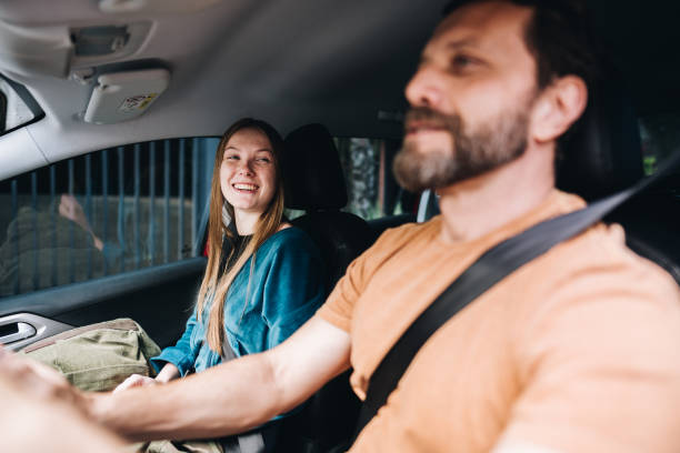 istock Father and daughter talking in the car 1629591013