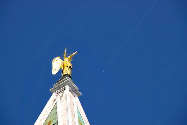 A stunning flight on the drone above the Peter and Paul Fortress in St. Petersburg at sunset. Flying around an angel on the spire of Peter and Paul Cathedral.