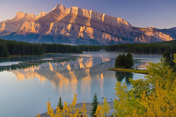istock Mountain ridges golden in sunrise light 162959646