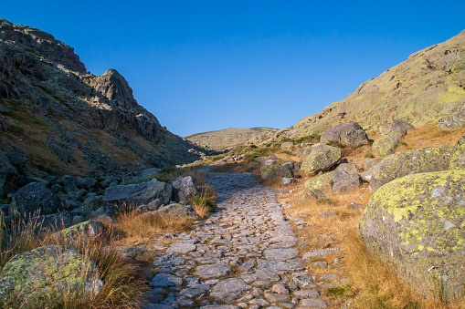 Trail next to the Prado Puerto Gorge at the start of the Laguna Grande trail, Big Lake trail, in Navacepeda de Tormes, Avila, Spain.