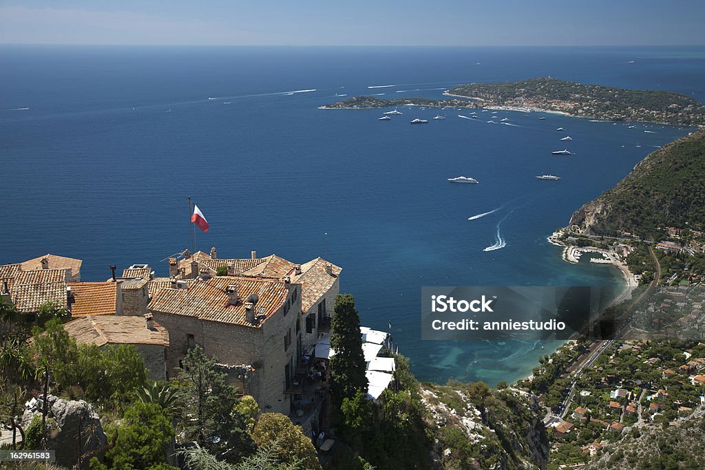 Overlook Mediterranean sea in Summer Overlook from the top of the garden of Eze, France in Summer. Scenic View of Mediterranean sea with blue sky. French Flag Stock Photo