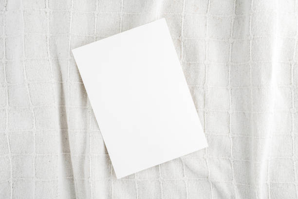 istock Empty Wedding invitation mockup on linen fabric background 1629626612