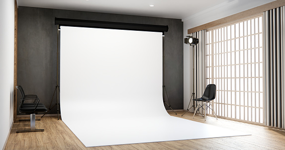 Studio room camera Modern Film Studio with blank white Screen.