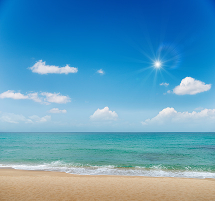 Beautiful seascape and sun on blue sky