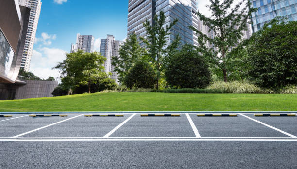 istock Empty parking lot in the office park 1629631756