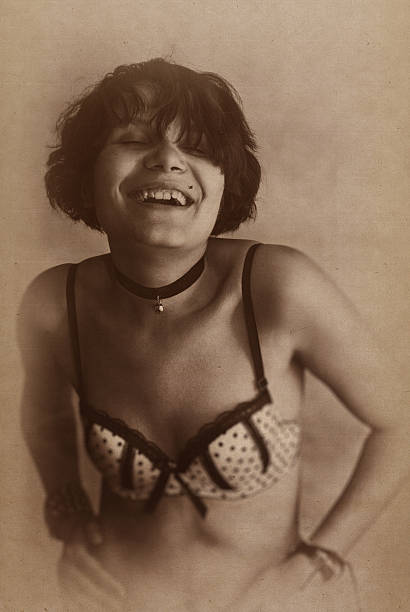 istock vintage laughing girl in bra 162963599