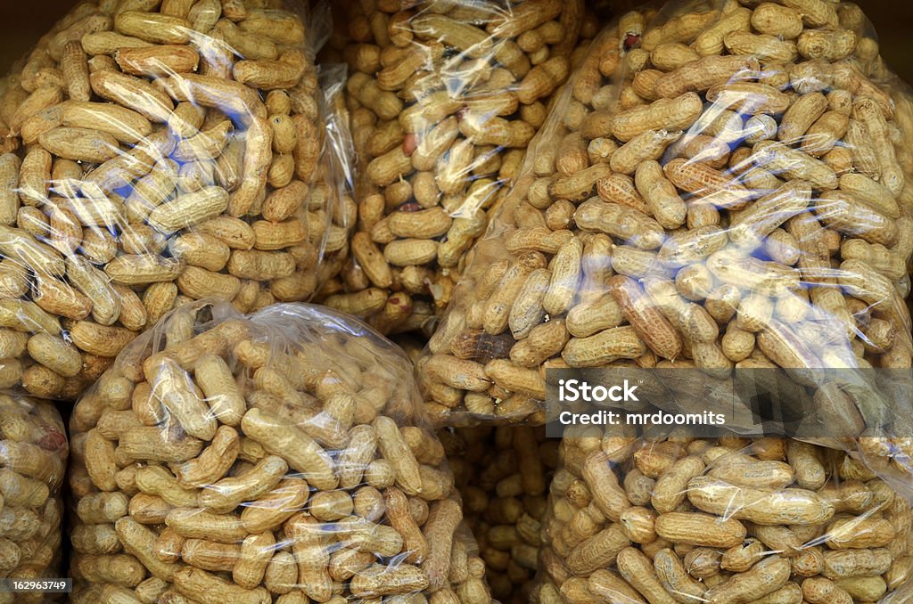Peanuts At A Market Background Food Image Of Bags Of Peanuts At A Market Peanut - Food Stock Photo