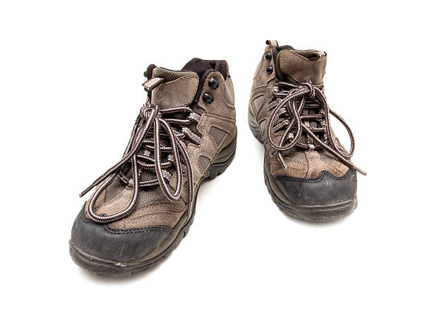 istock Old hiking boots isolated on white background 162963909