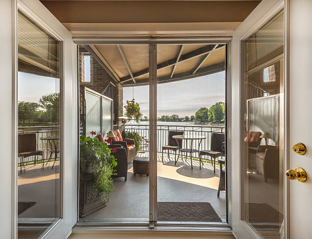 istock Lake and balcony view through patio doors 162963930