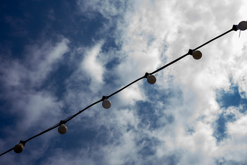 cloudy and blue sky,hanging lights