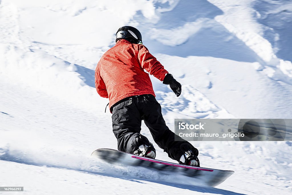 Giovane uomo snowboard - Foto stock royalty-free di Snowboard