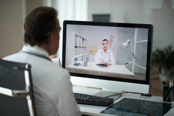 istock Doctor Video Calling Colleague 1629692734