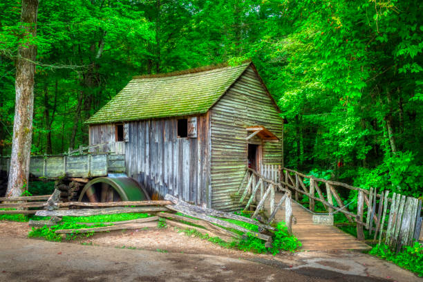 Cades Cove, Tennessee, United States  August 4, 2023: Horizontal panorama shot of Cades Cove Cable Grist Mill.