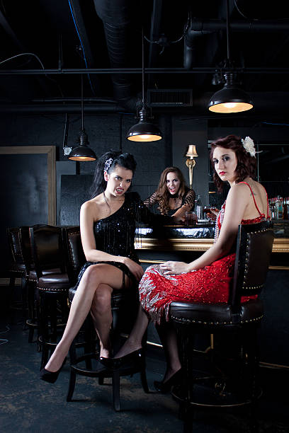 istock Beautiful Vampire women barring teeth at bar 162970704