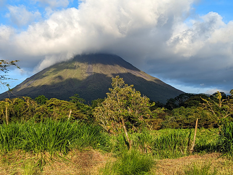 Cloudcap over the summit of Arenal Volcano near La Fortuna along Arenal Lake in Costa Rica