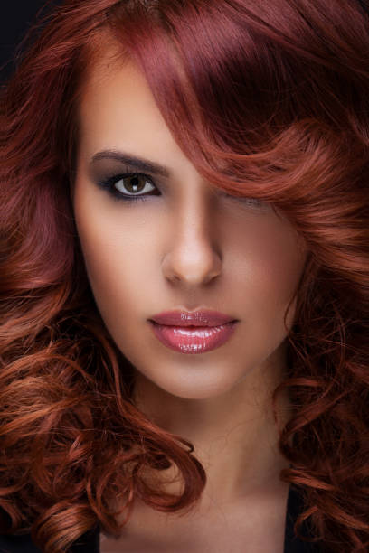 istock Glamorous red hair women 162970837