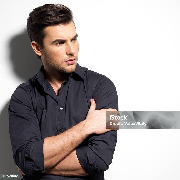 Fashion Portrait Of Young Man In Black Shirt Stock Photo - Download Image Now - Hairstyle, Men, Beautiful People