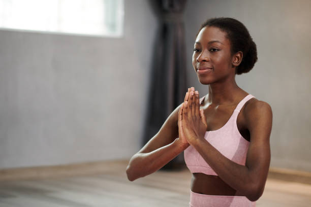 istock Black Woman Practising Yoga 1629716537