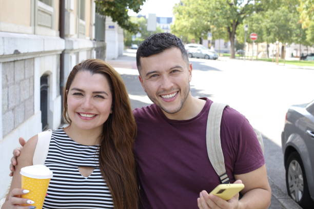 Beautiful couple falling in love A beautiful couple is posing outdoors. The man is Hispanic and the woman is Hispanic. He has 33 years old and she is 35. mediterranean ethnicity stock pictures, royalty-free photos & images