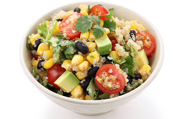 istock White bowl of quinoa salad with other fresh ingredients 162972700
