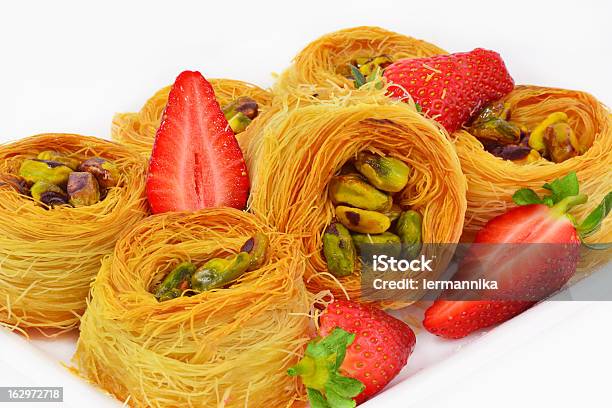 Baklava With Pistachio Nuts And Strawberry Stock Photo - Download Image Now - Baklava, Horizontal, No People
