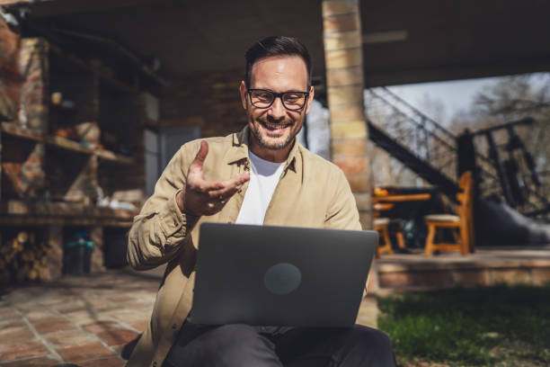 istock One man happy caucasian male use laptop computer for work video call 1629757472