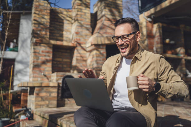 One man happy caucasian male use laptop computer for work video call