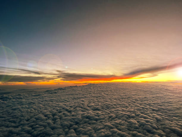 cockpit point of view cloudy sky at sunrise time horizontal still