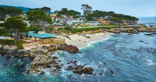 Photo of Aerial Clinton Walker House by Frank Lloyd Wright and Carmel Beach with houses