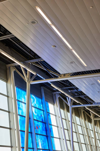 istock Blue art tiles on windows leading to white sky and ceiling view 1629774818