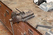 vise on a bronze workbench