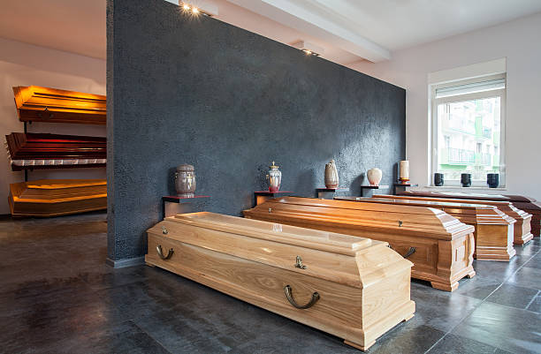 Funeral home with wooden coffin Coffins standing in funeral house funeral parlor photos stock pictures, royalty-free photos & images