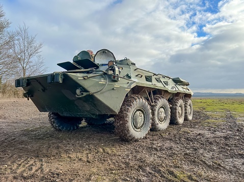 Salisbury, United Kingdom – March 08, 2023: A high-resolution close-up of a Soviet Russian BTR-80 8x8 wheeled amphibious armoured personnel carrier is depicted in this image