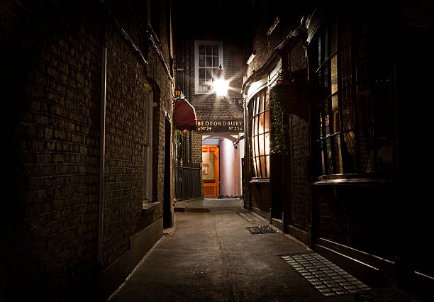 Old Fashioned London Alleyway An old fashioned London Alleyway in the city. alley stock pictures, royalty-free photos & images