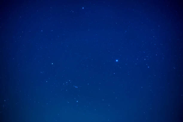 istock Night dark sky with bright stars 1629879447