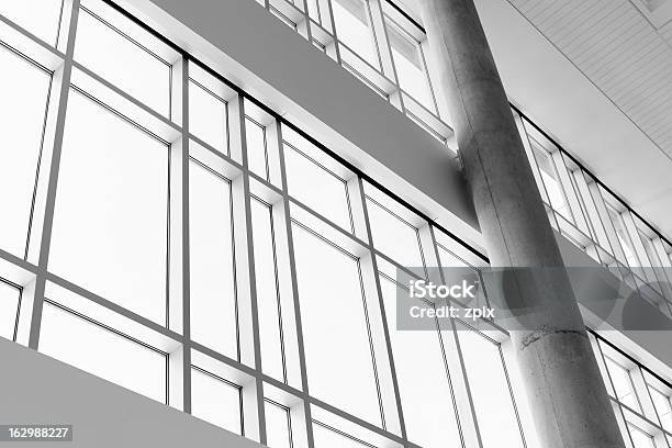Low Angle View Throug Windows In A Modern Building Stock Photo - Download Image Now - Architecture, Backgrounds, Brightly Lit