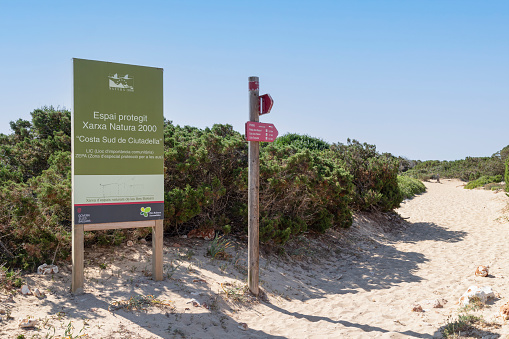 Son Xoriguer, Spain, June 23, 2023; Hiking trails through protected area along the coast of the island of Menorca.